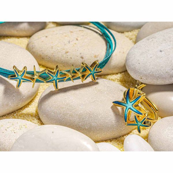 Ring ATLANTIS turkis sjøstjerner gull Onirolithi